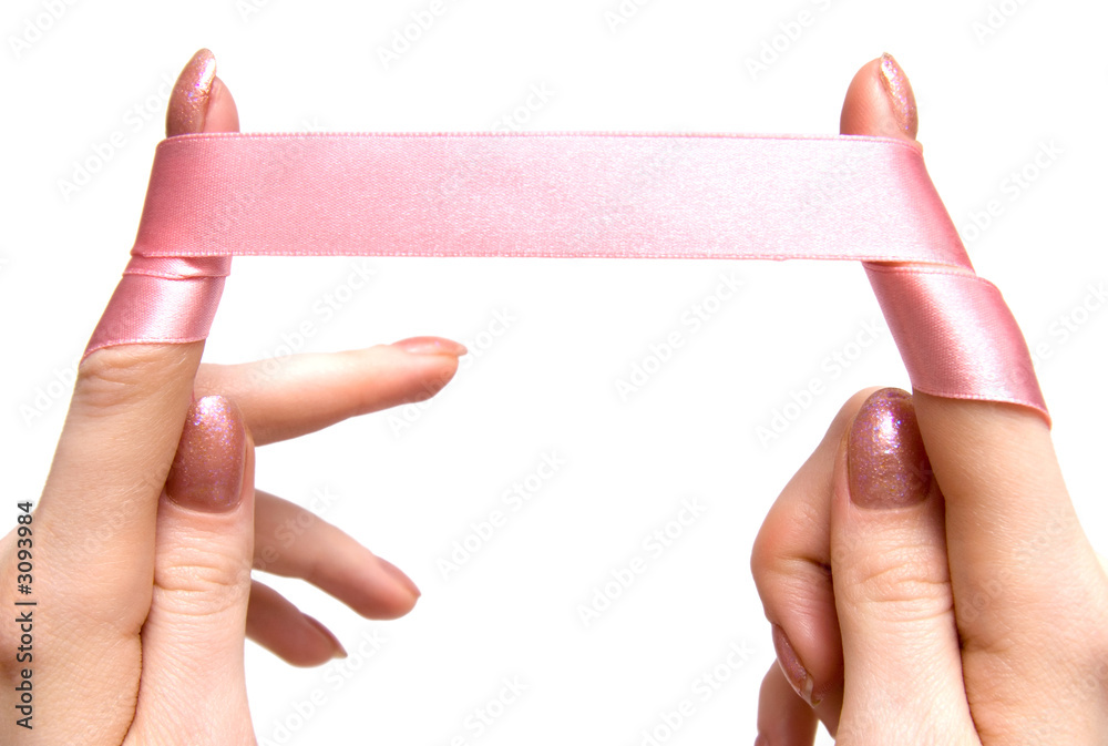 fingers with pink ribbon