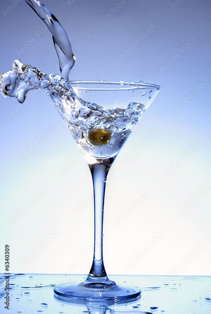 Martini being poured into a glass