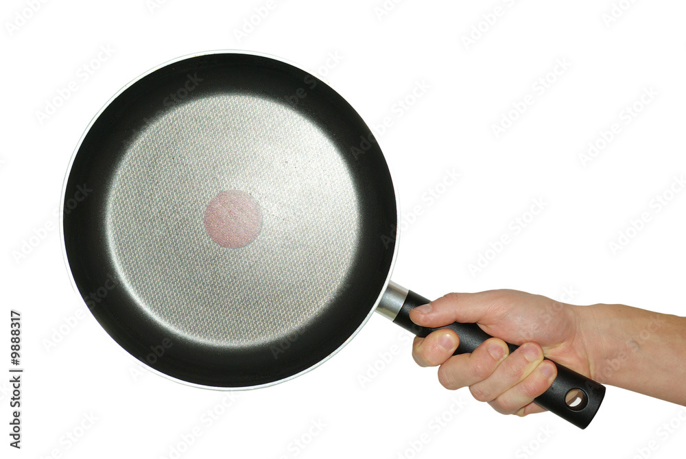 Hand and frying pan