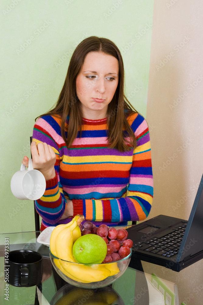 Woman with empty cup