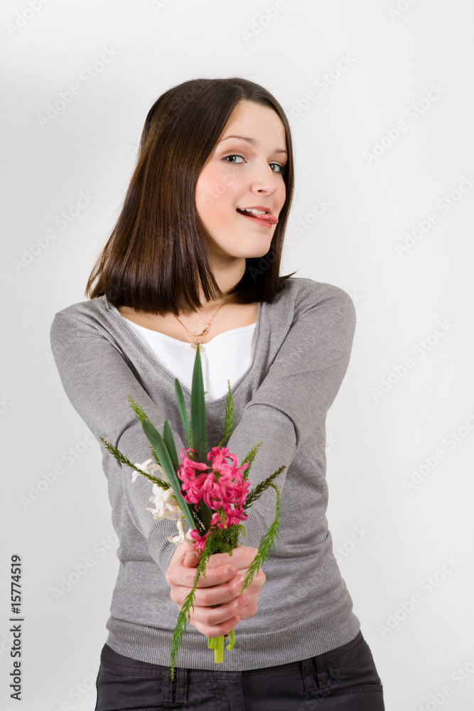 woman with bouquet of flowers flirting