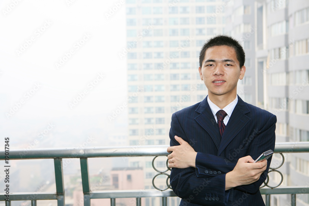 young asian businessman On the Balcony