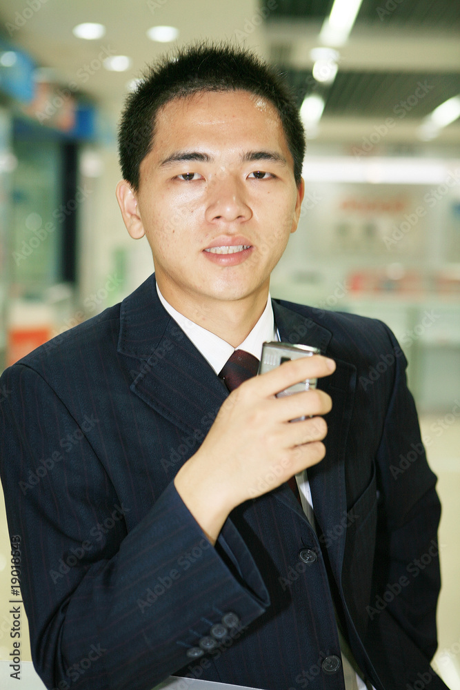 young asian businessman in office