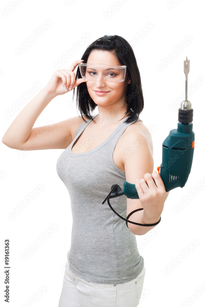 Woman with drill for wood