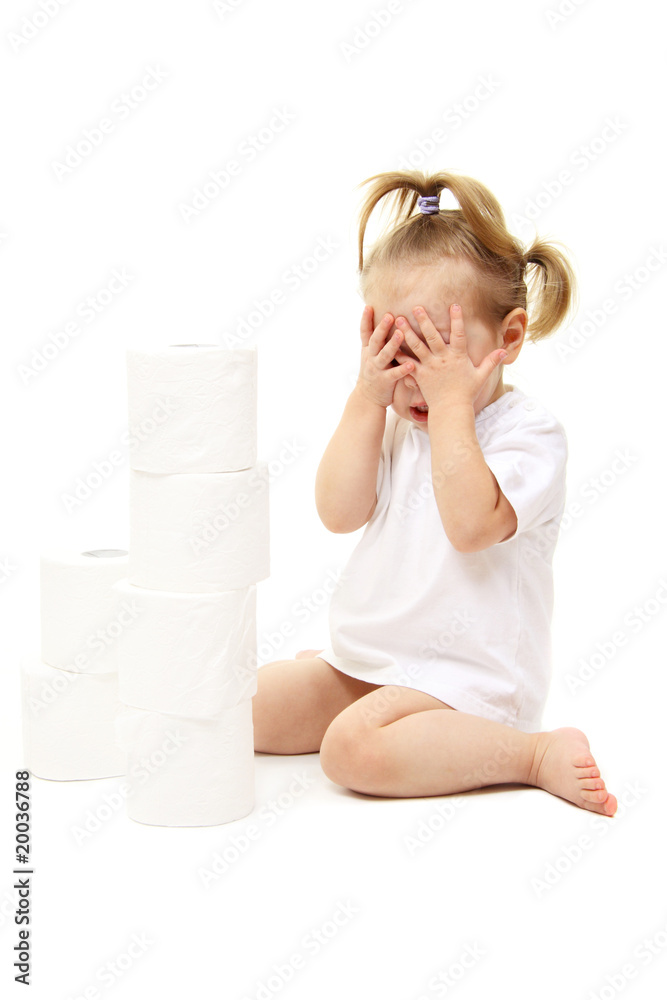 Baby girl with toilet paper