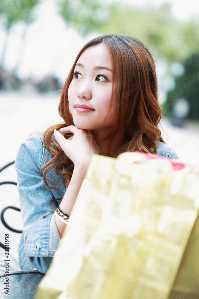 asian girl with shopping bags