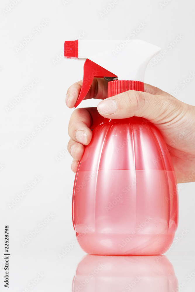 Holding a pink spray cans