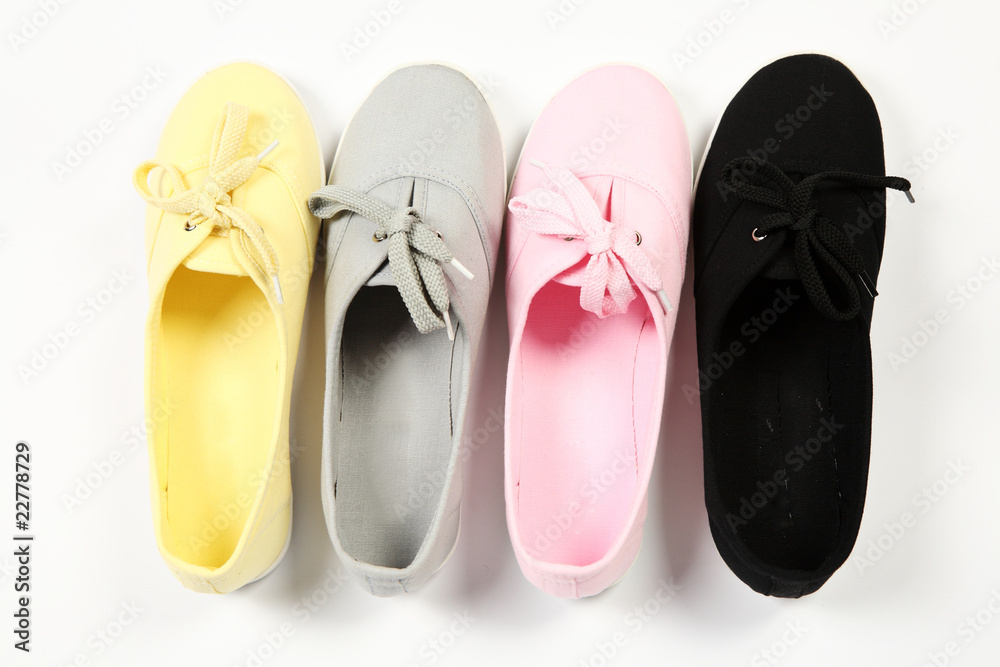 grey ,pink,yellow  and black women shoes with white background