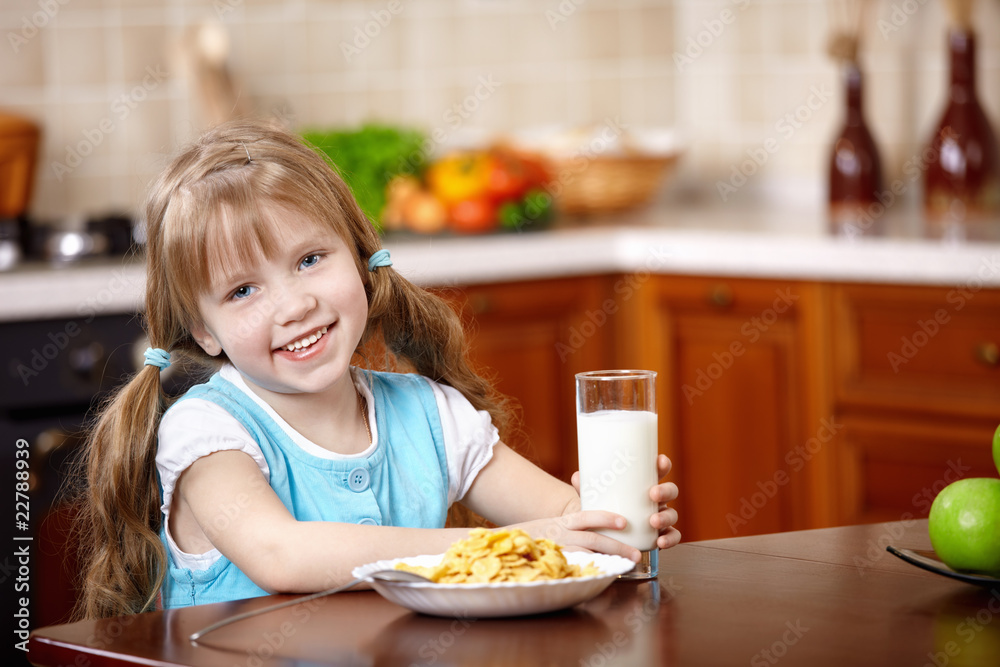 The girl has breakfast