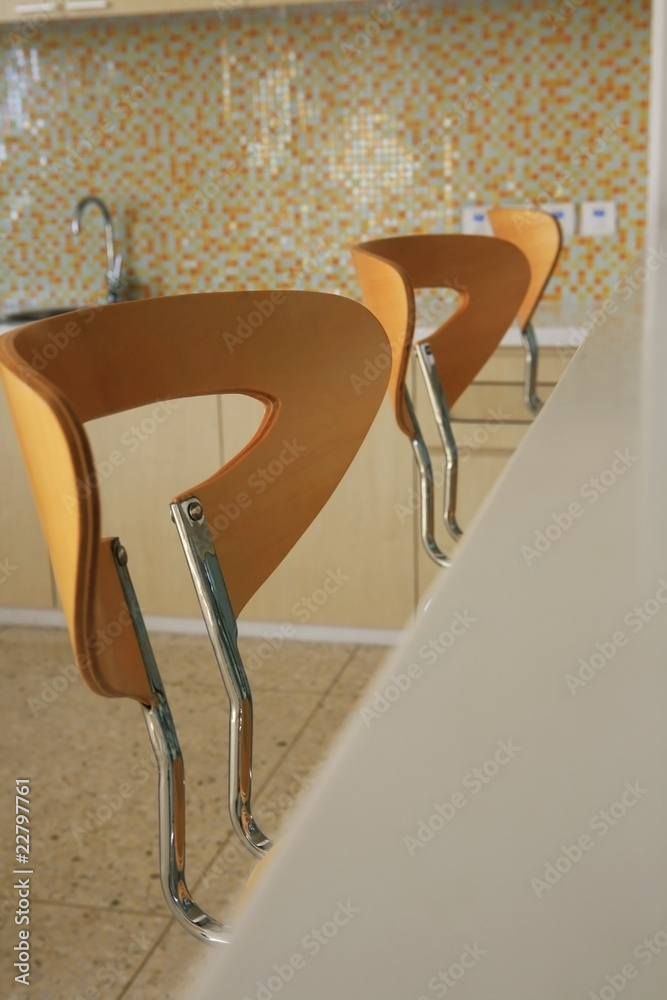 Chair beside the table in the bar