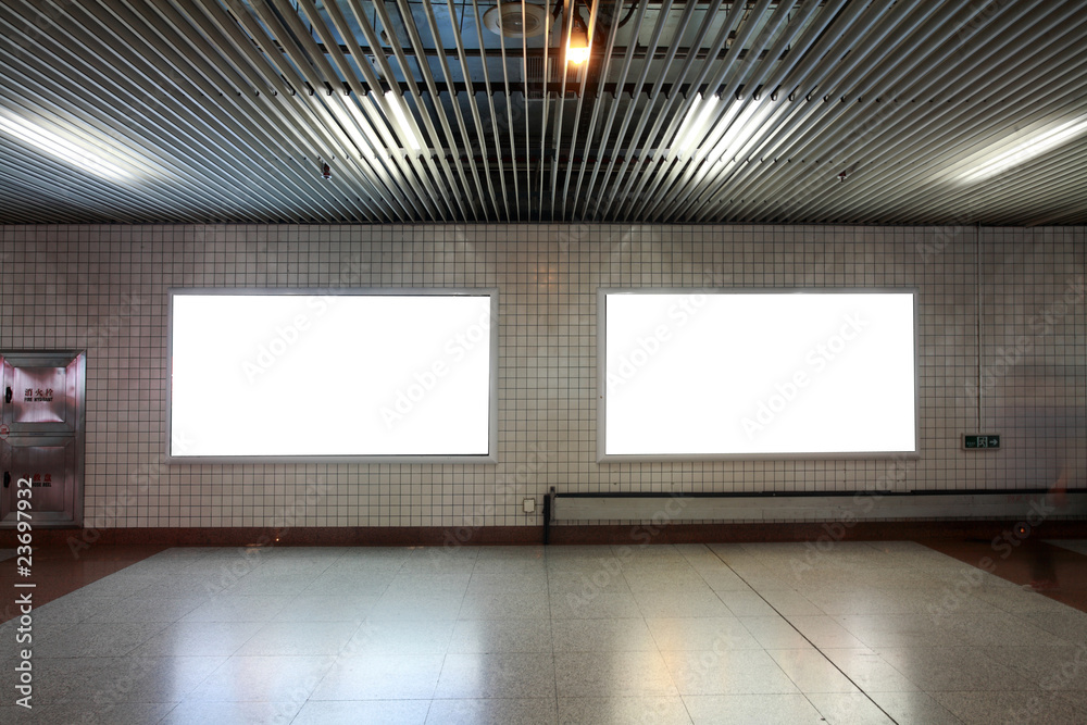 frames on  wall at night in city