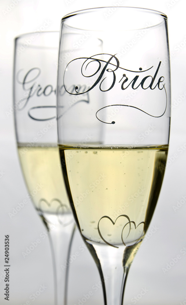 Bride and groom glasses with champagne