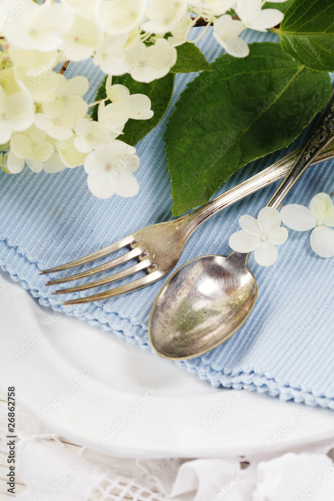 place setting with hydrangea flower