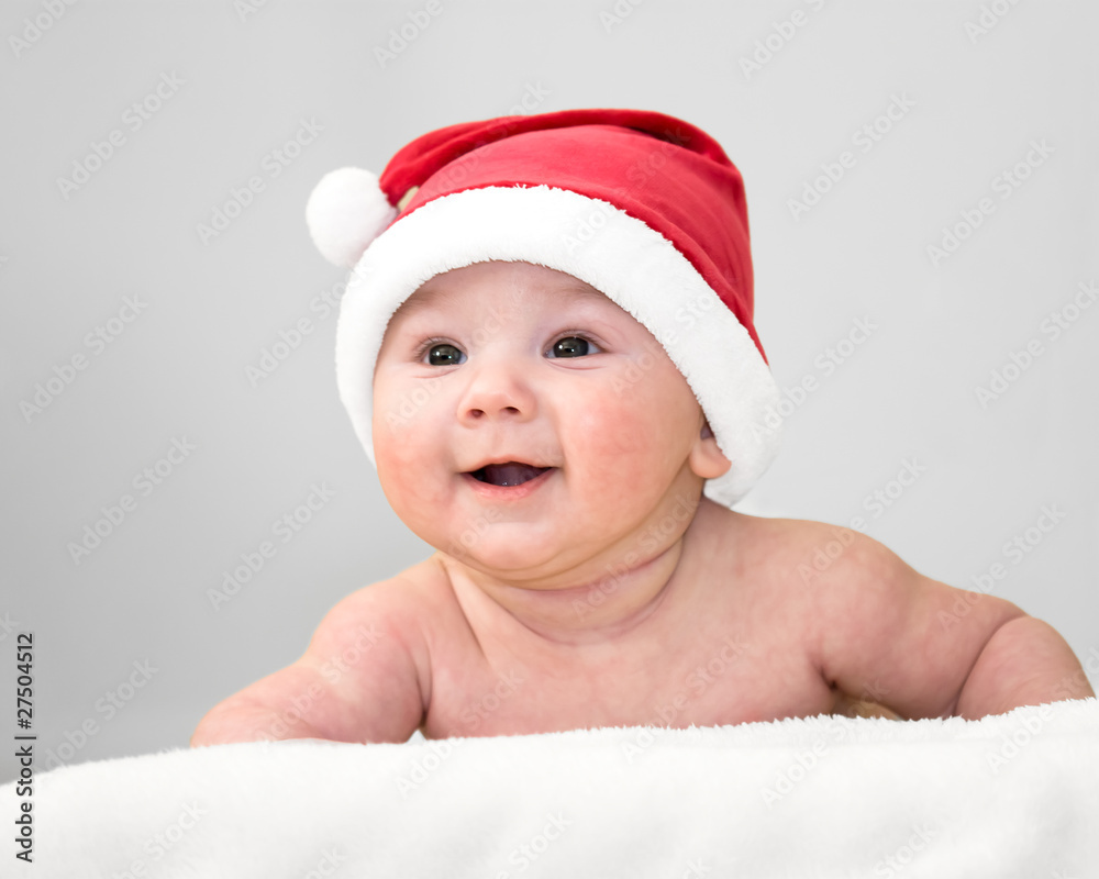 Cute baby boy in santa hat