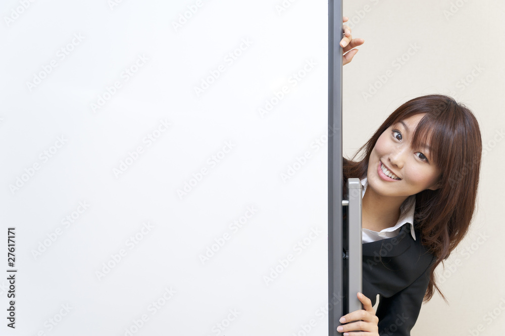 a portrait of young business woman with blank white board