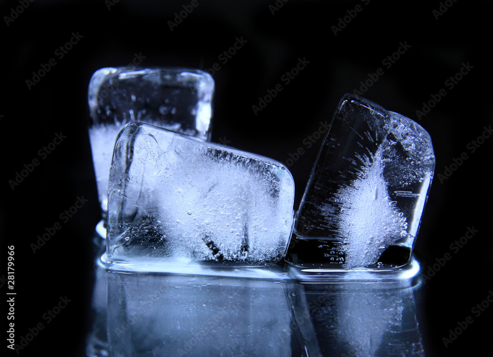 Ice cubes on black background