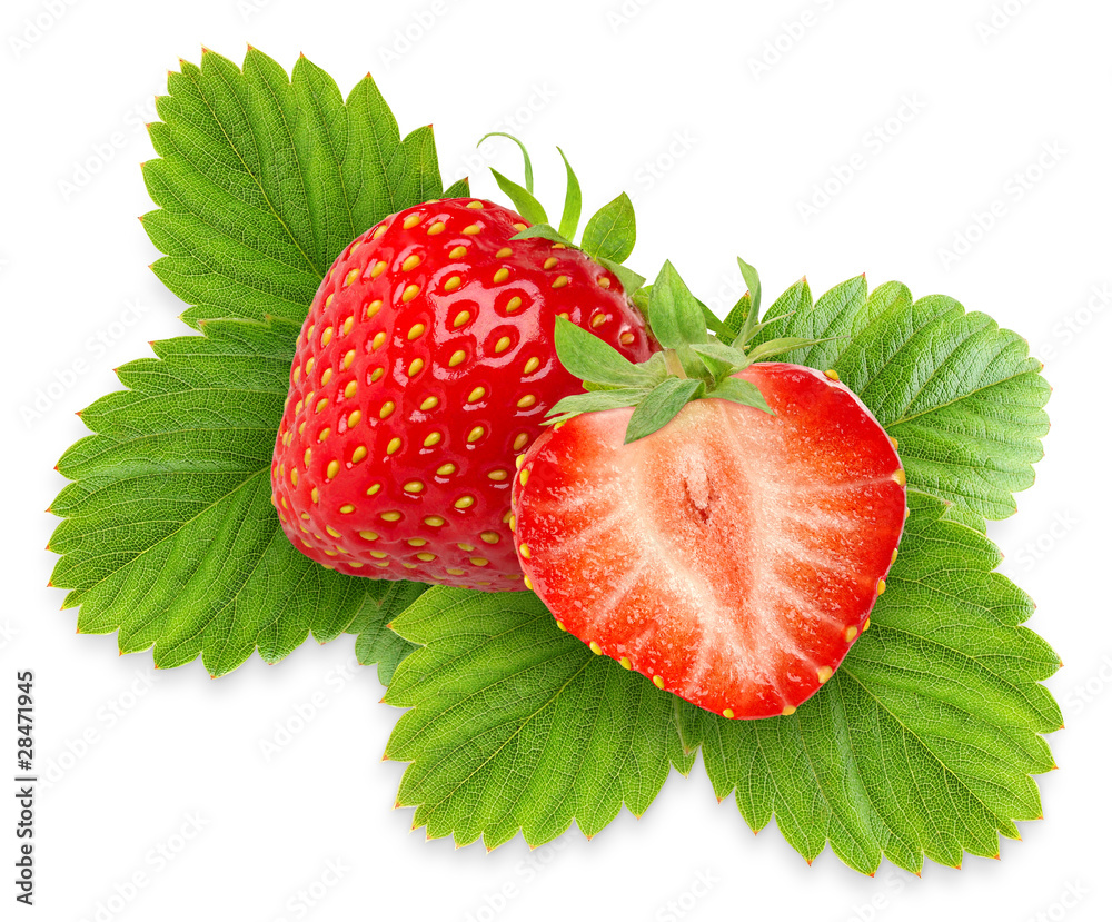 Isolated strawberries. Two strawberries, one cut in half over green leaves isolated on white backgro