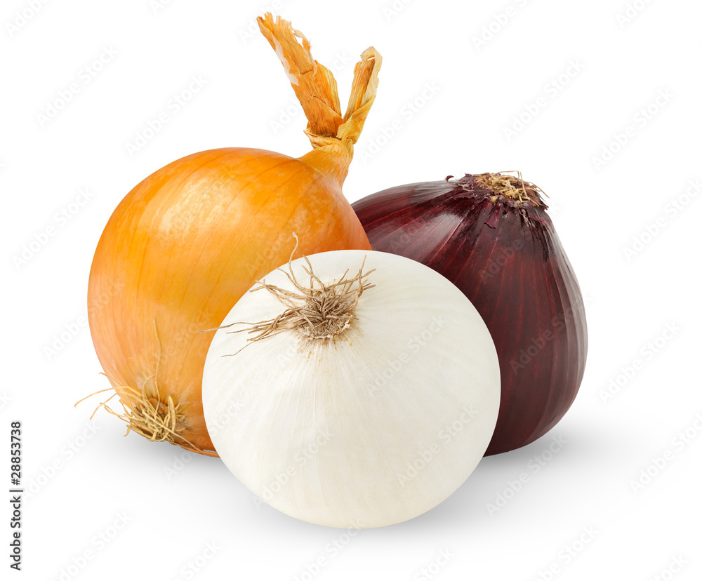 isolated onions. Three onion bulbs of different colors (red, yellow and white) isolated on white bac