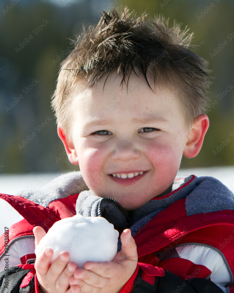 boy with snow ball