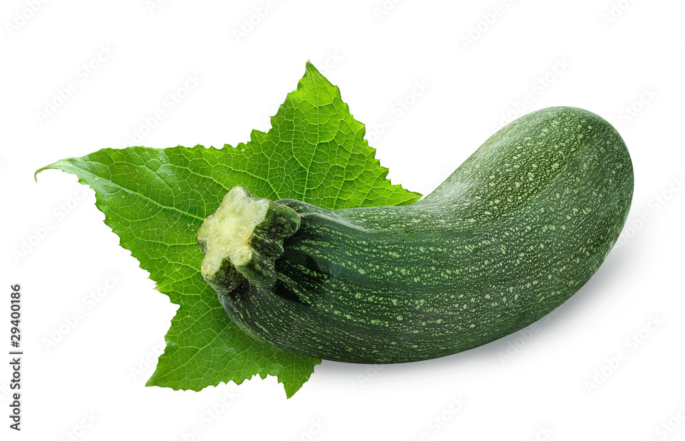 Isolated zucchini. One fresh zucchini with leaf isolated on white background