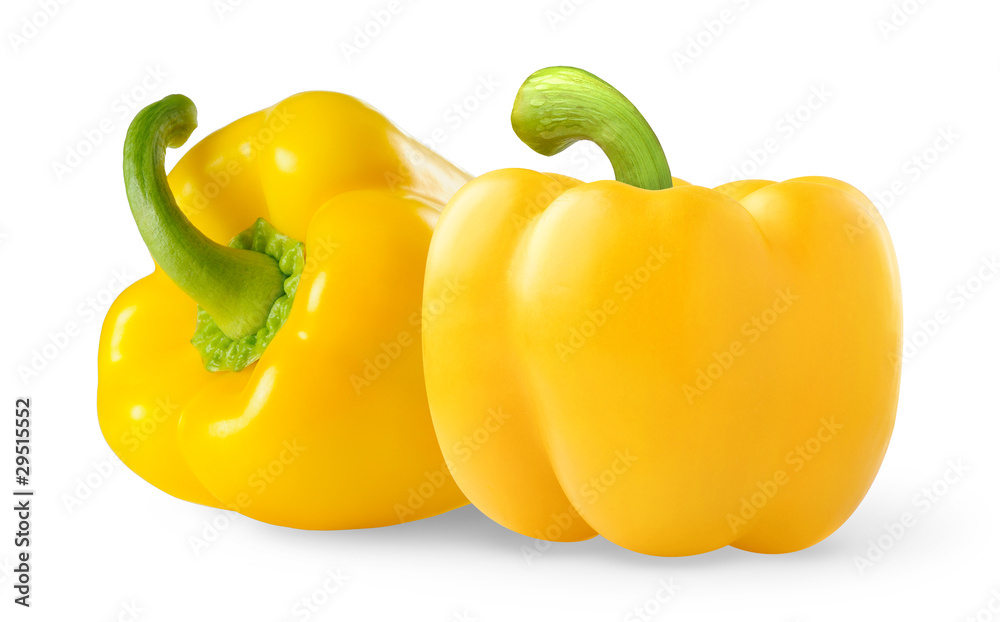 Isolated peppers. Two yellow bell peppers isolated on white background