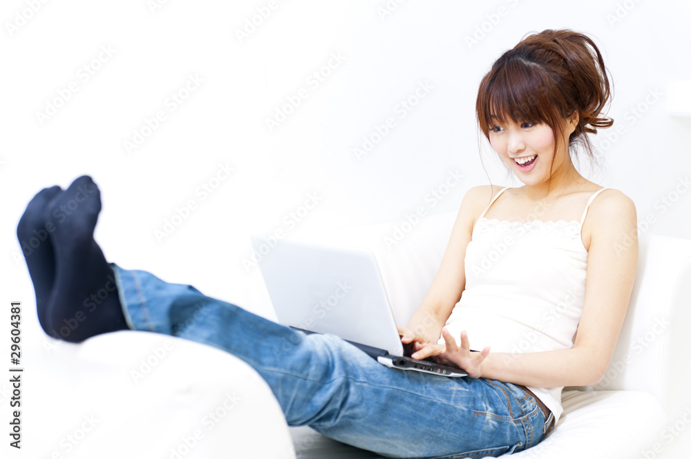 a portrait of beautiful asian woman using a laptop