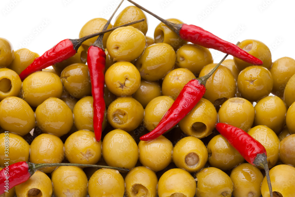 Pile of olives with red chili pepper