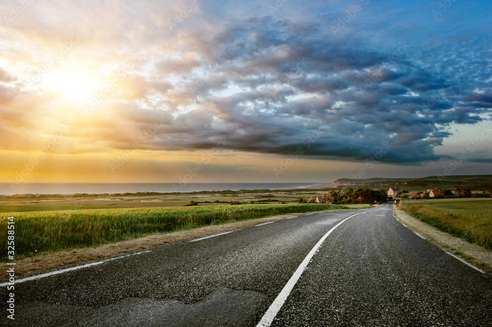 Sunset landscape with coastal road