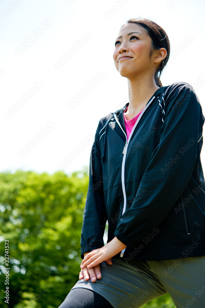 beautiful asian woman exercising in the park