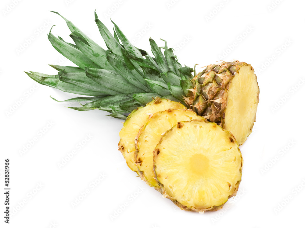 Ripe pineapple with lush green leaves