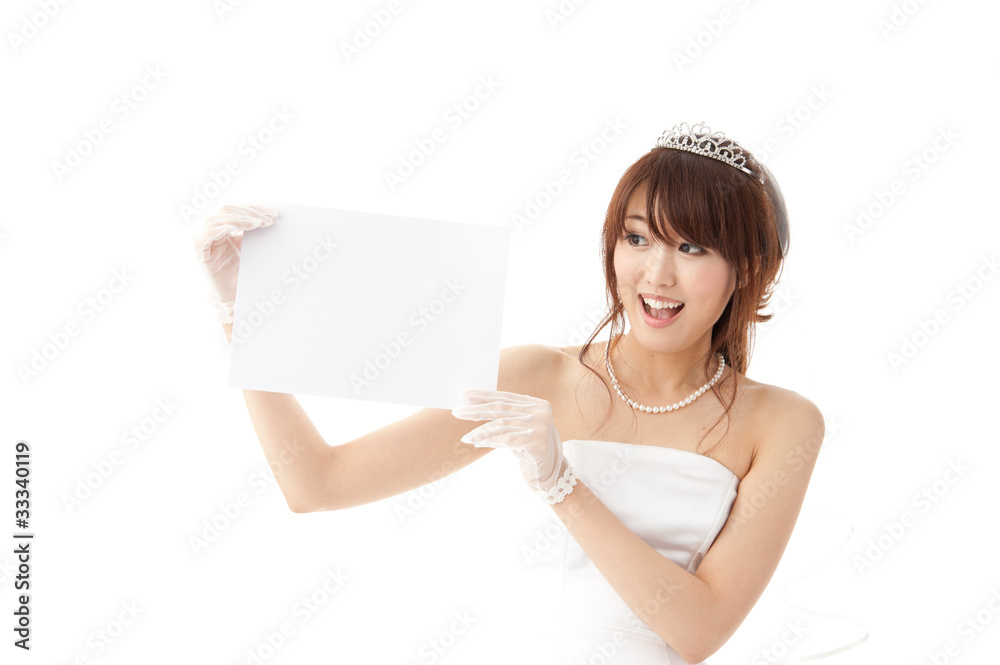 beautiful asian bride holding a blank whiteboard