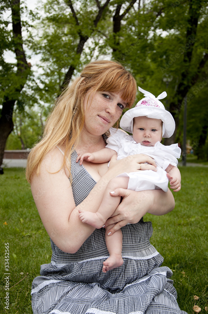 Mum and baby in park