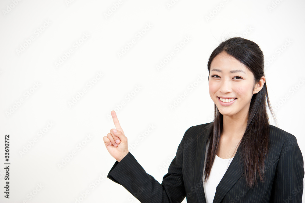 a portrait of asian businesswoman pointing