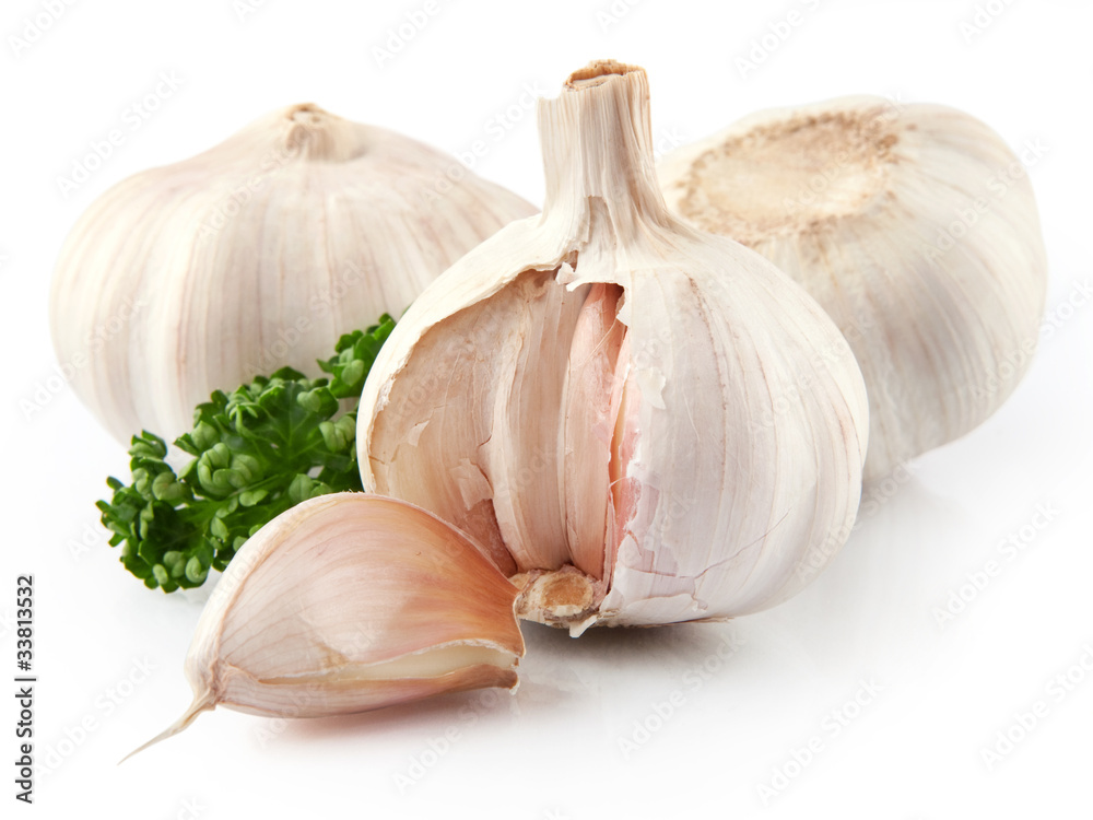 garlic decorated parsley leaves isolated on white background