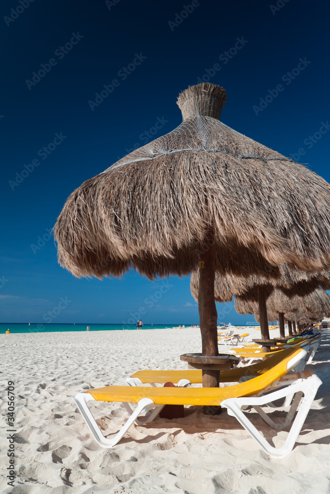 Relaxation under parasol at Caribbean Sea