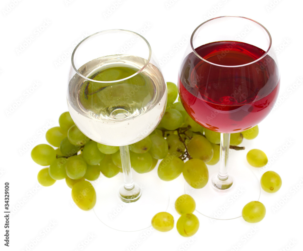 Glasses of white and rose wine and grapes over white