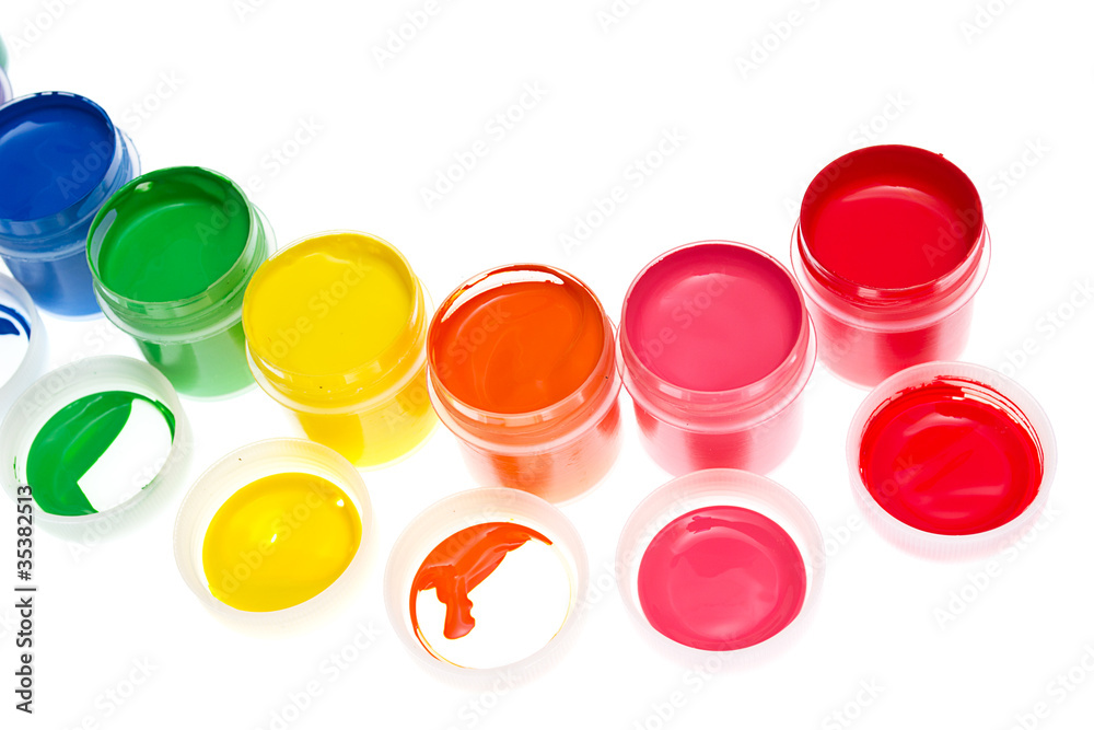 Multi-colored gouache paint isolated on a white background