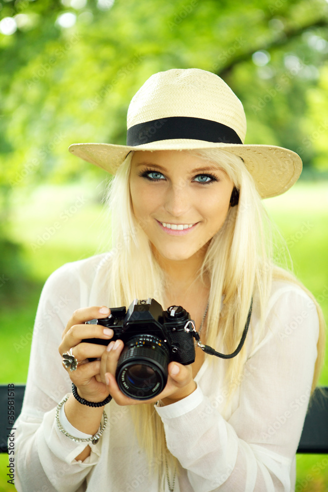 Cute girl with camera