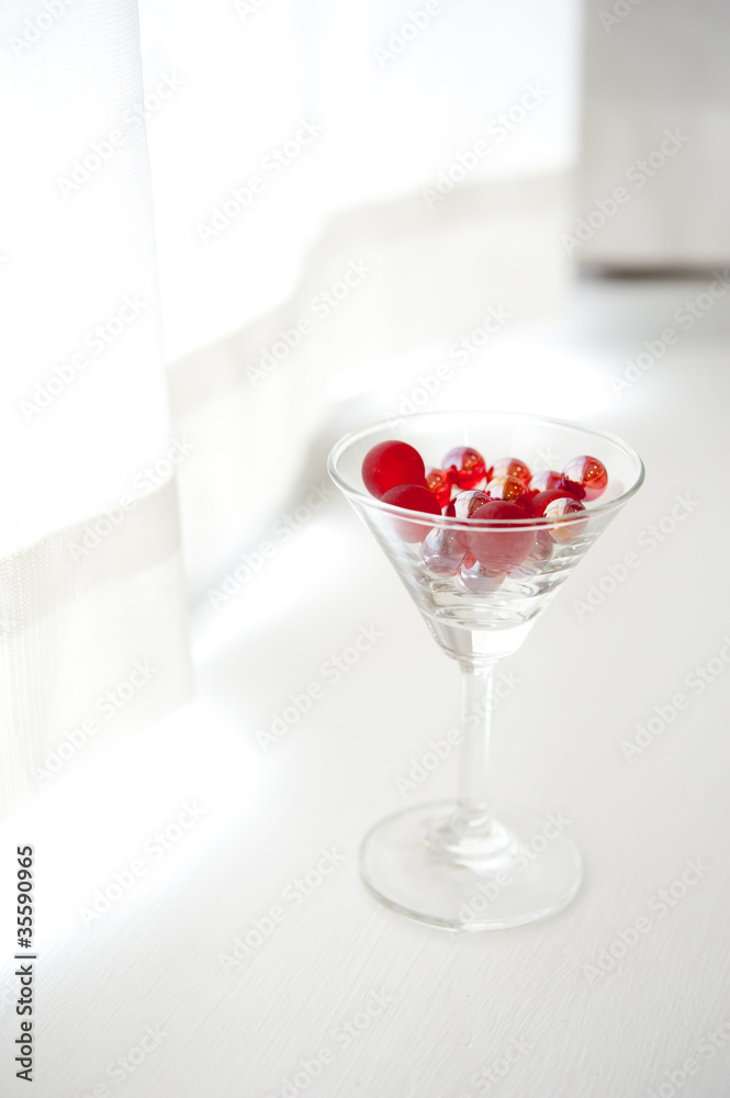 cocktail glass with red marble