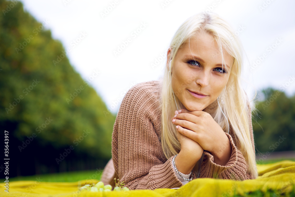 Young woman with cute smile in park