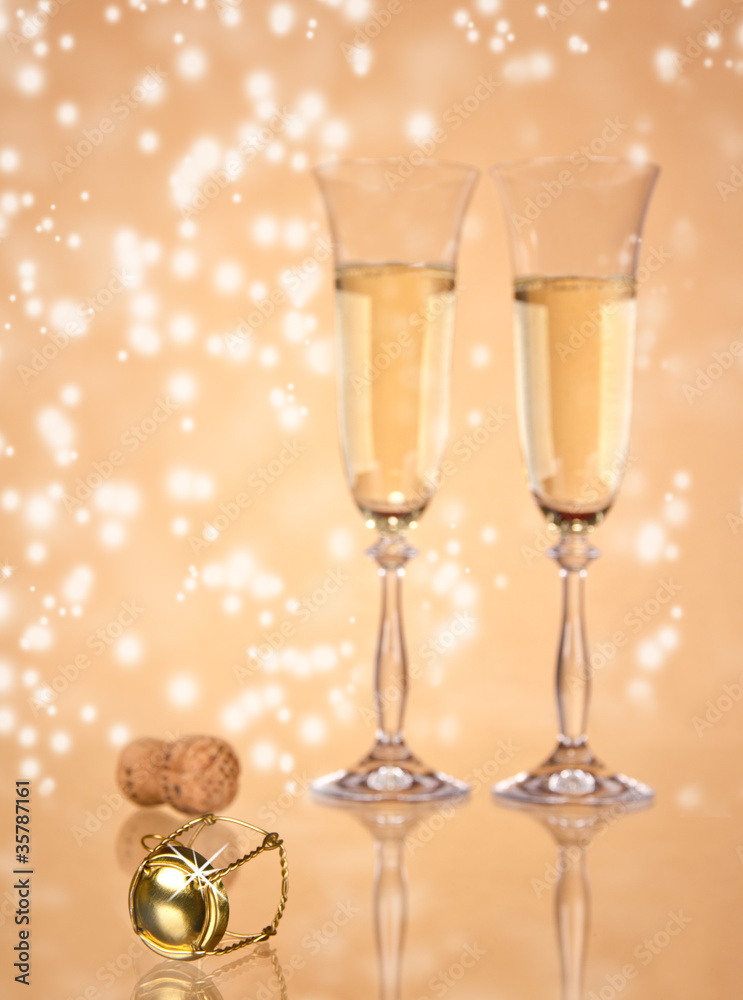 Champagne glasses, focused on cork