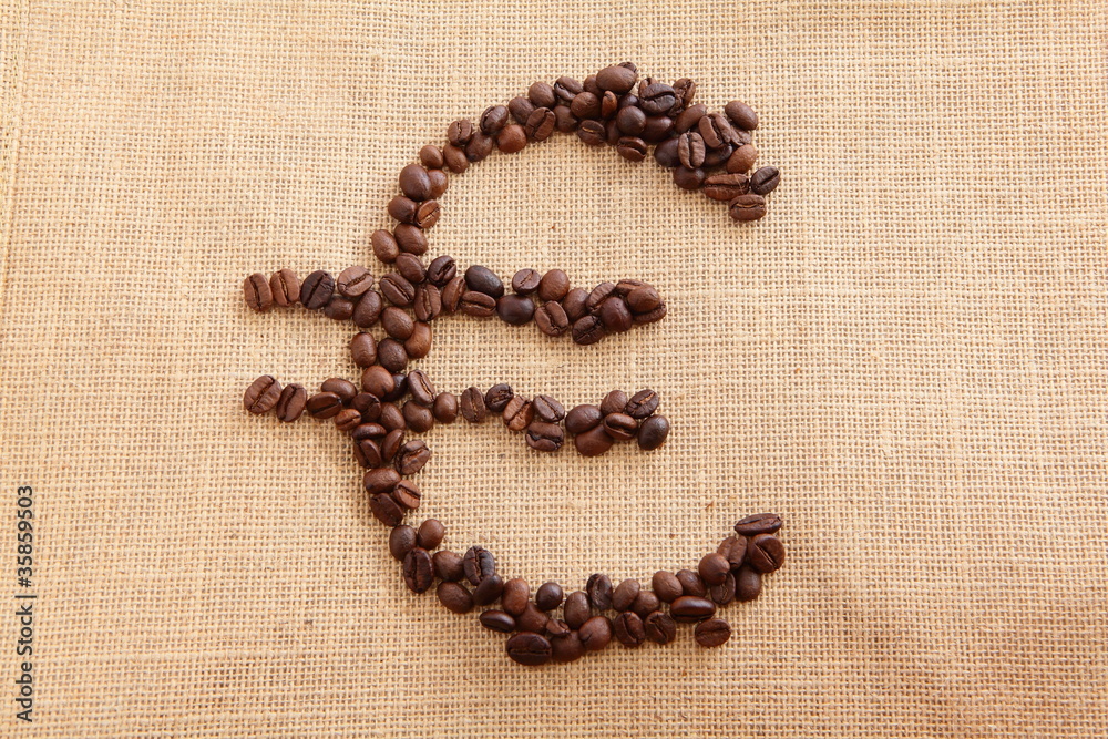 Coffee beans on linen background