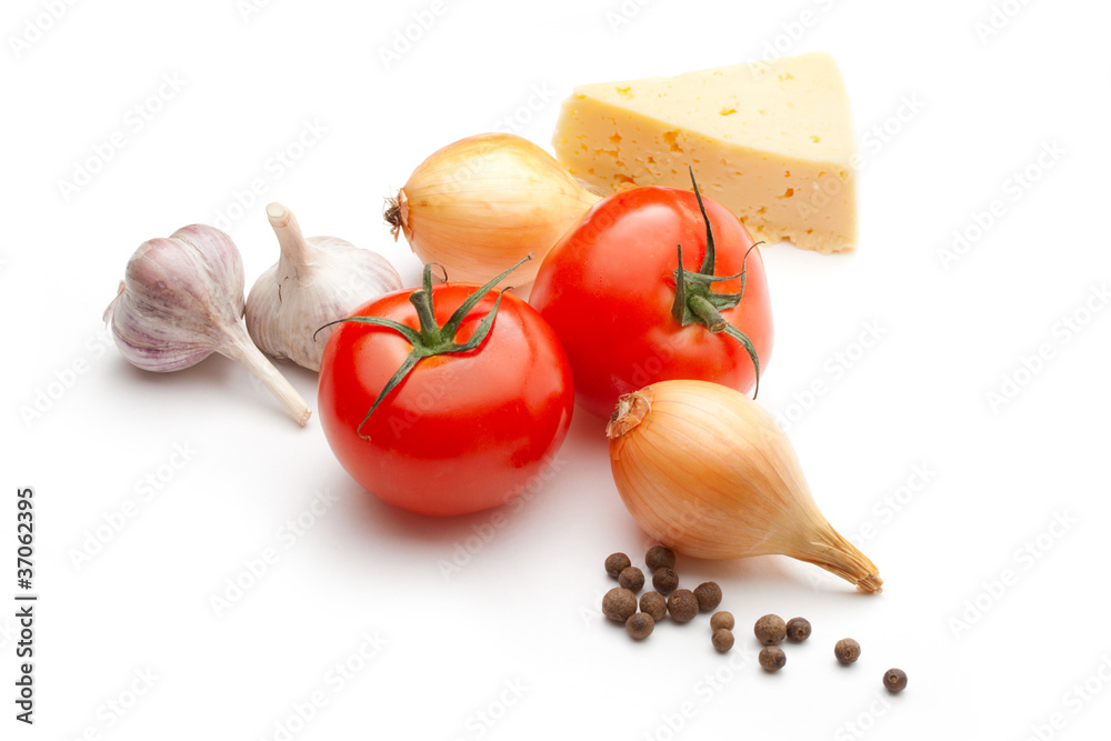 Tomatoes, cheese, onions, pepper and garlic on white background