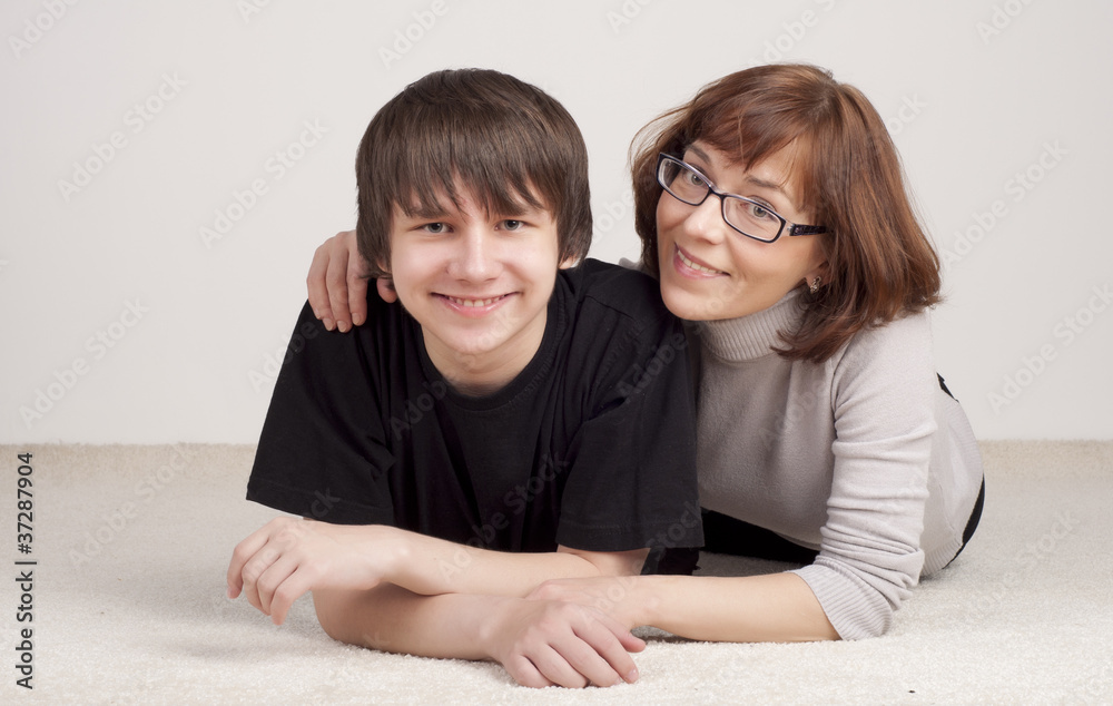 mother and son are together and smile