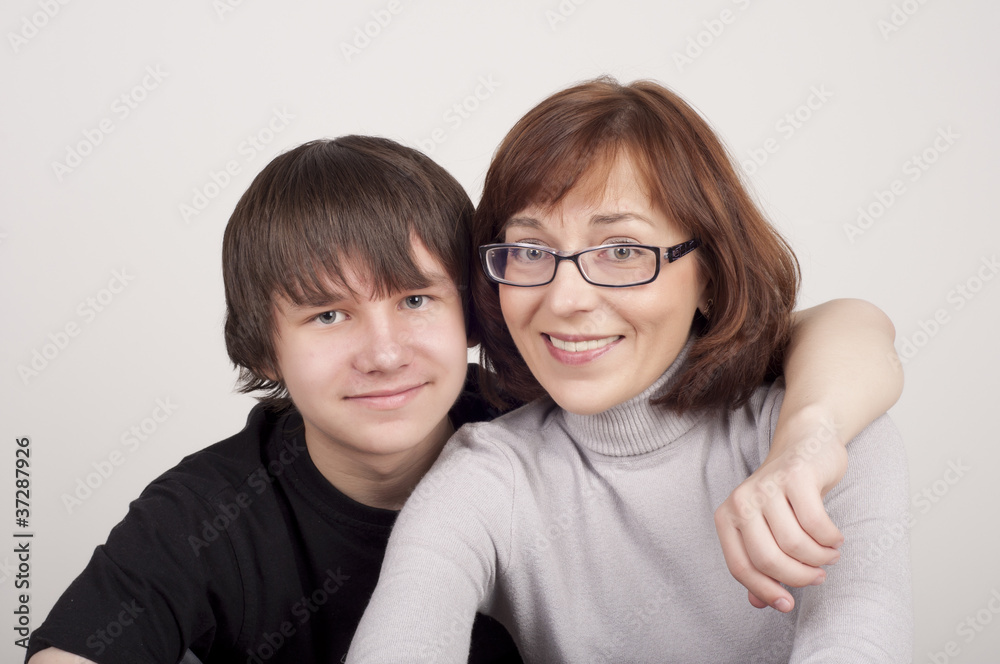 mother and son are together and smile