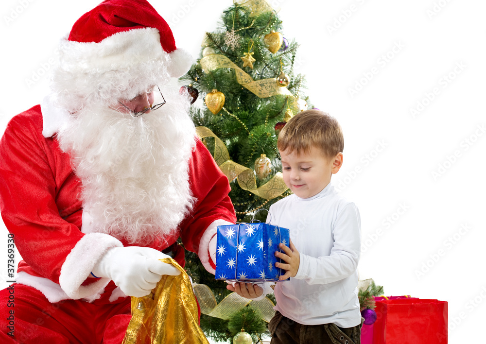 Santa Claus giving Christmas gifts to children