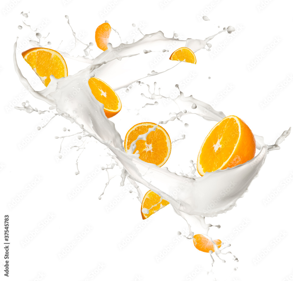 Oranges in milk splash, isolated on white background