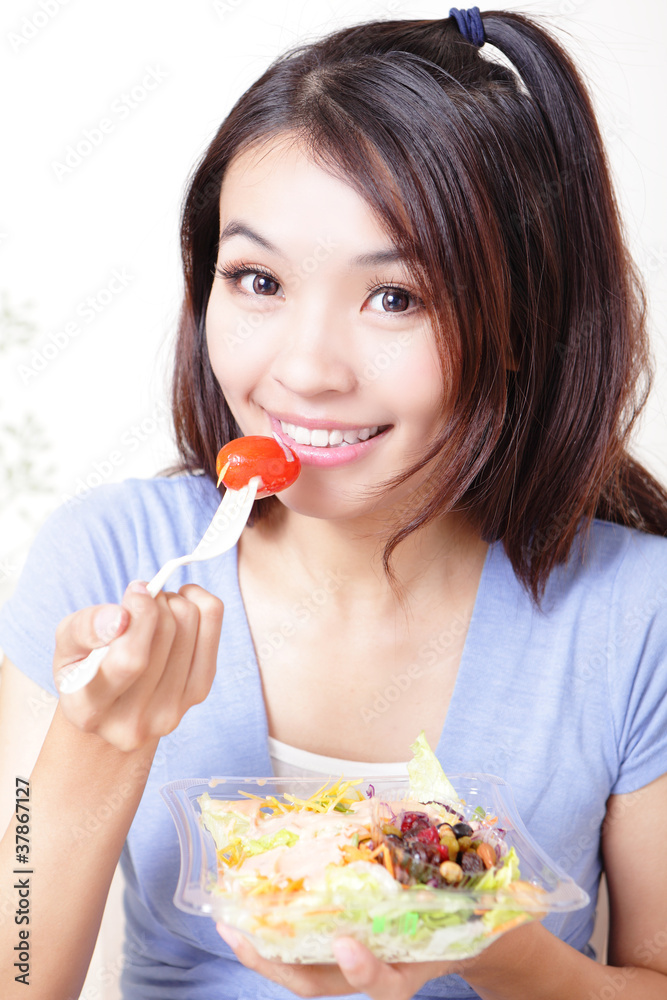 happy smiling young woman eat salad include vegetarian and fruit