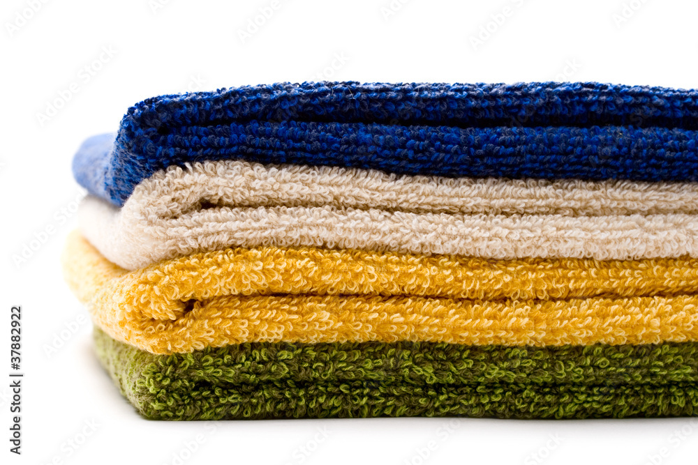 A pile of towels on white