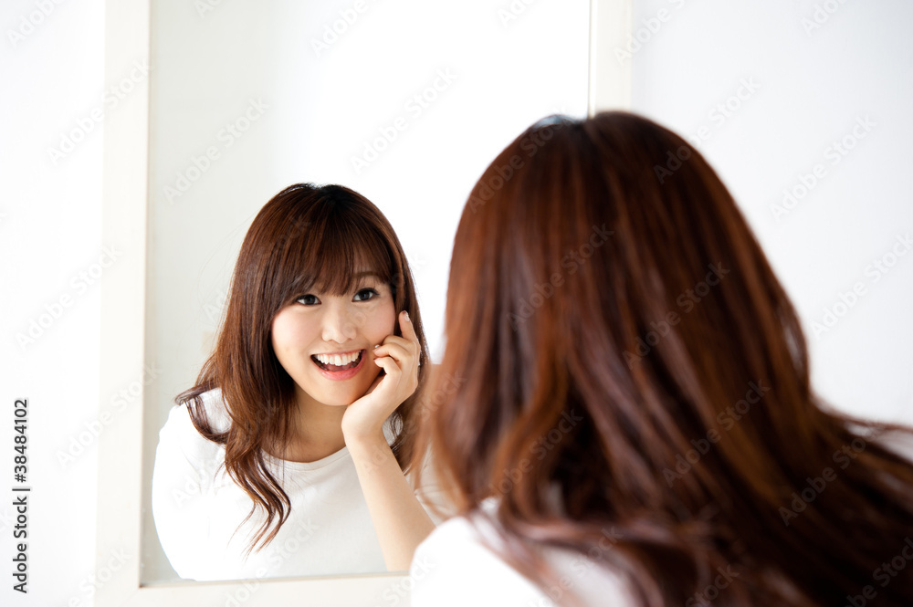 attractive asian woman in the bathroom